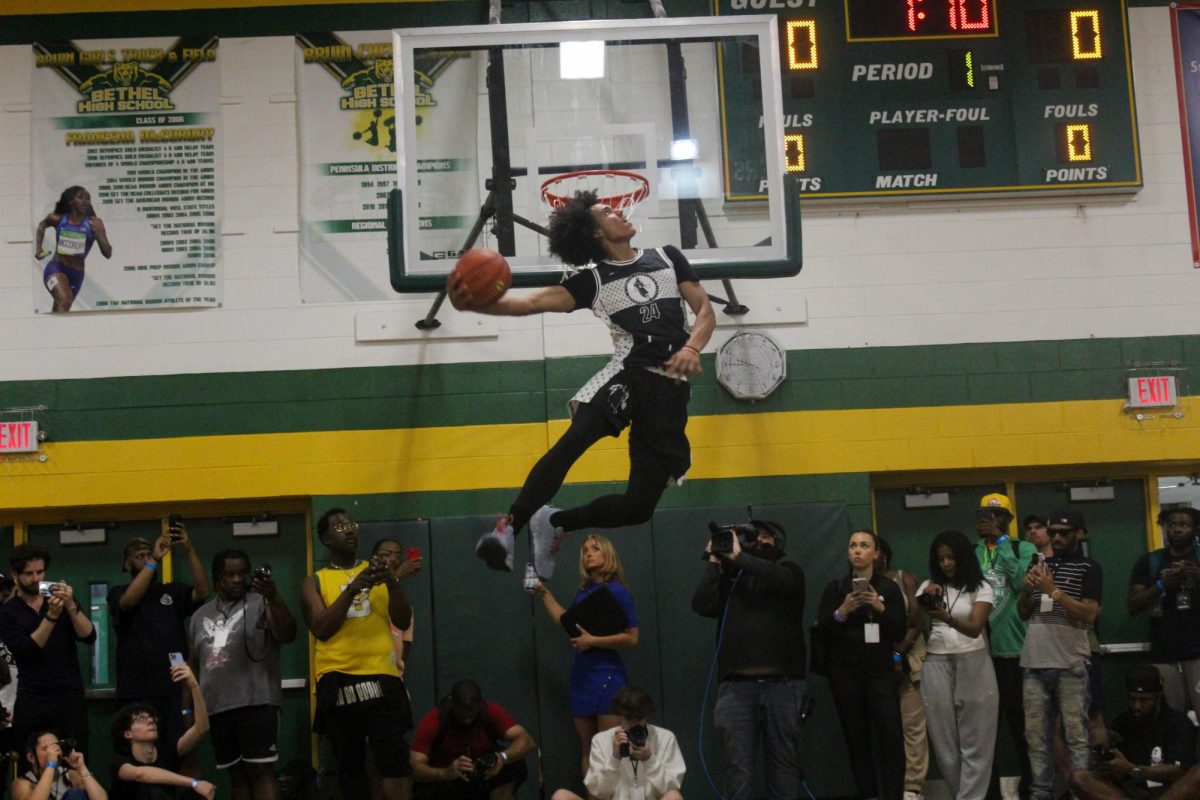 Uconn commit Isaiah Abraham performing and 360 windmill during the dunkcontest