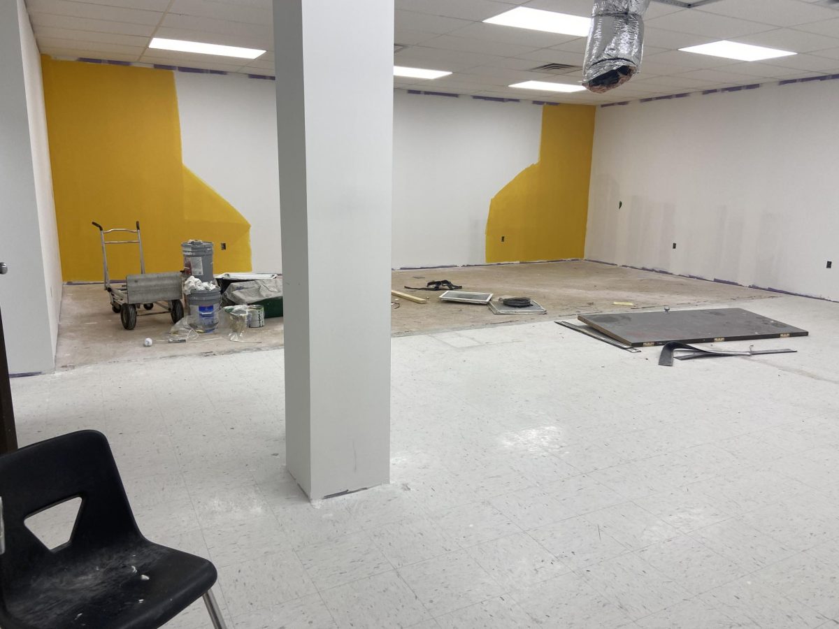 Wall was removed in old Teacher workroom to begin converting it into the new MAD Lab.