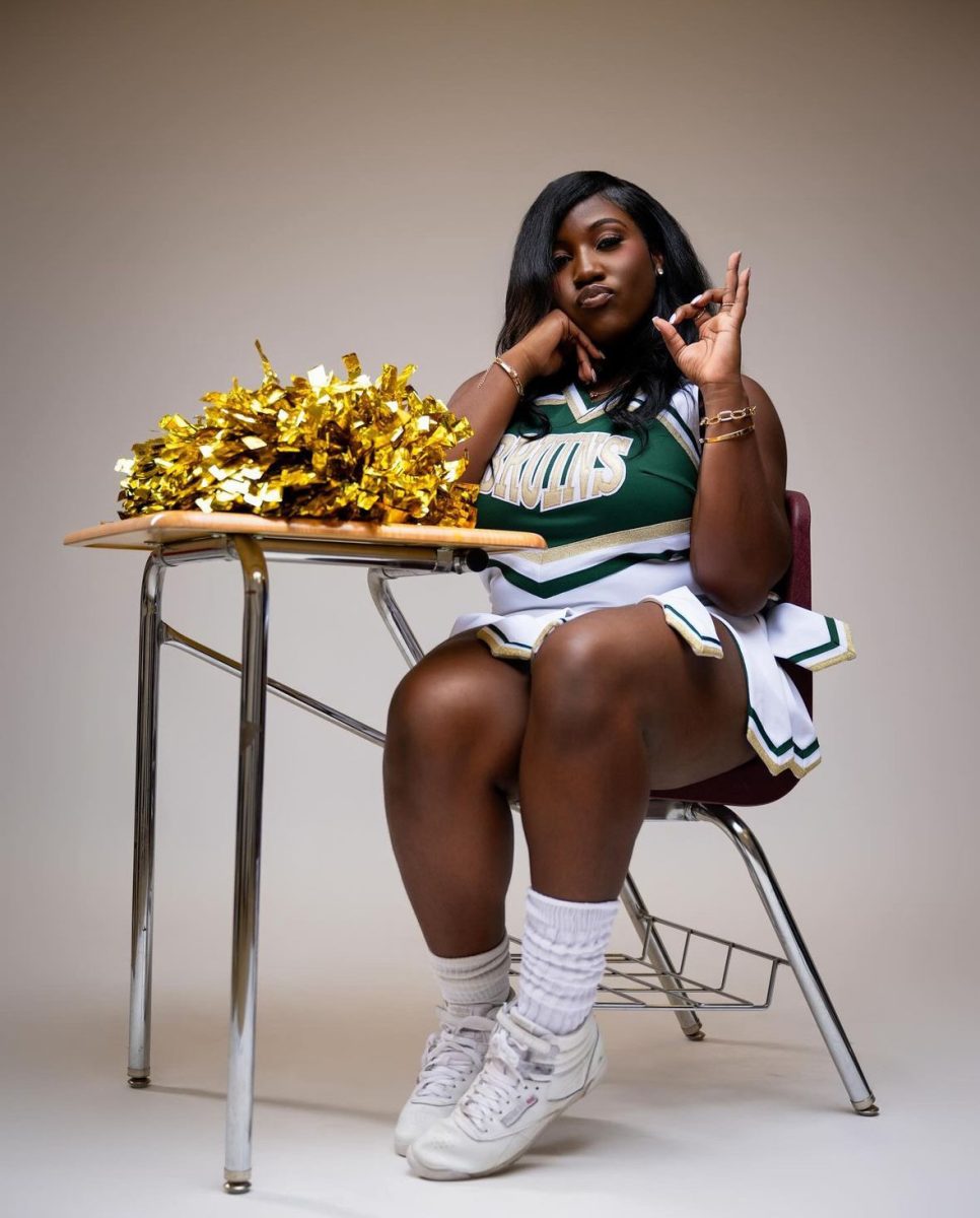 Juliana Baker is a senior and a co-captain of the Bethel Cheer squad. ”As co-captain, I bring joy to the team,” Juliana said. “I try to keep everyone happy.” She wanted to become a cheerleader because of the immense influence they have on social media. She thinks that keeping a schedule is the best way to manage time as a cheerleader. While she works with her mom at her business, she is also a part of the SCA. She plays Roblox and paints in her free time. 